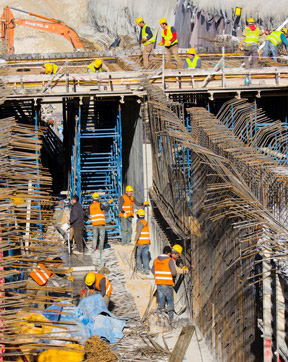 Manual workers on an underground construction site