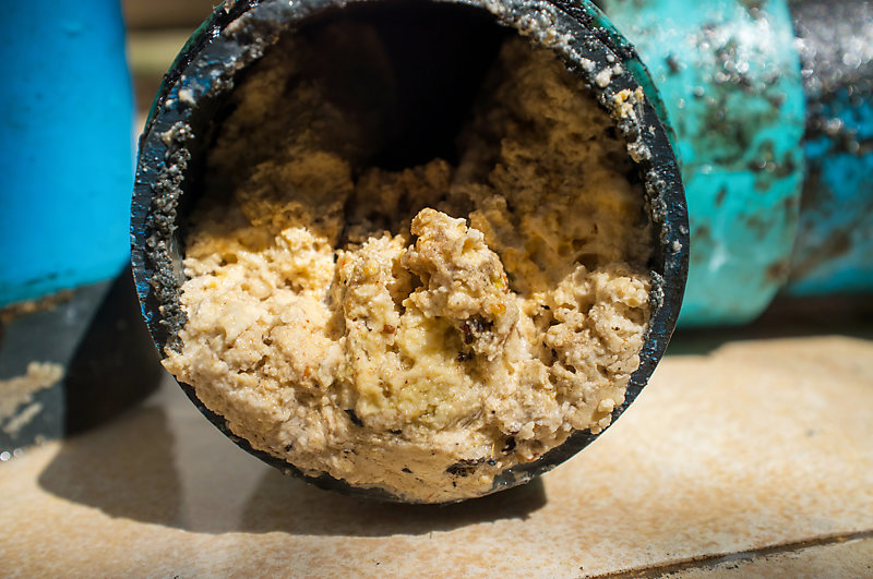 Filth flowing out of a sewage.