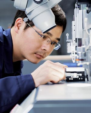 Employee performing an in-depth quality check.